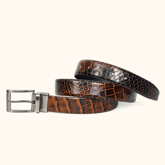 Imperio Elite Hand-Burnished Croc Leather Belt Flat Lay Coiled Burnt Cognac